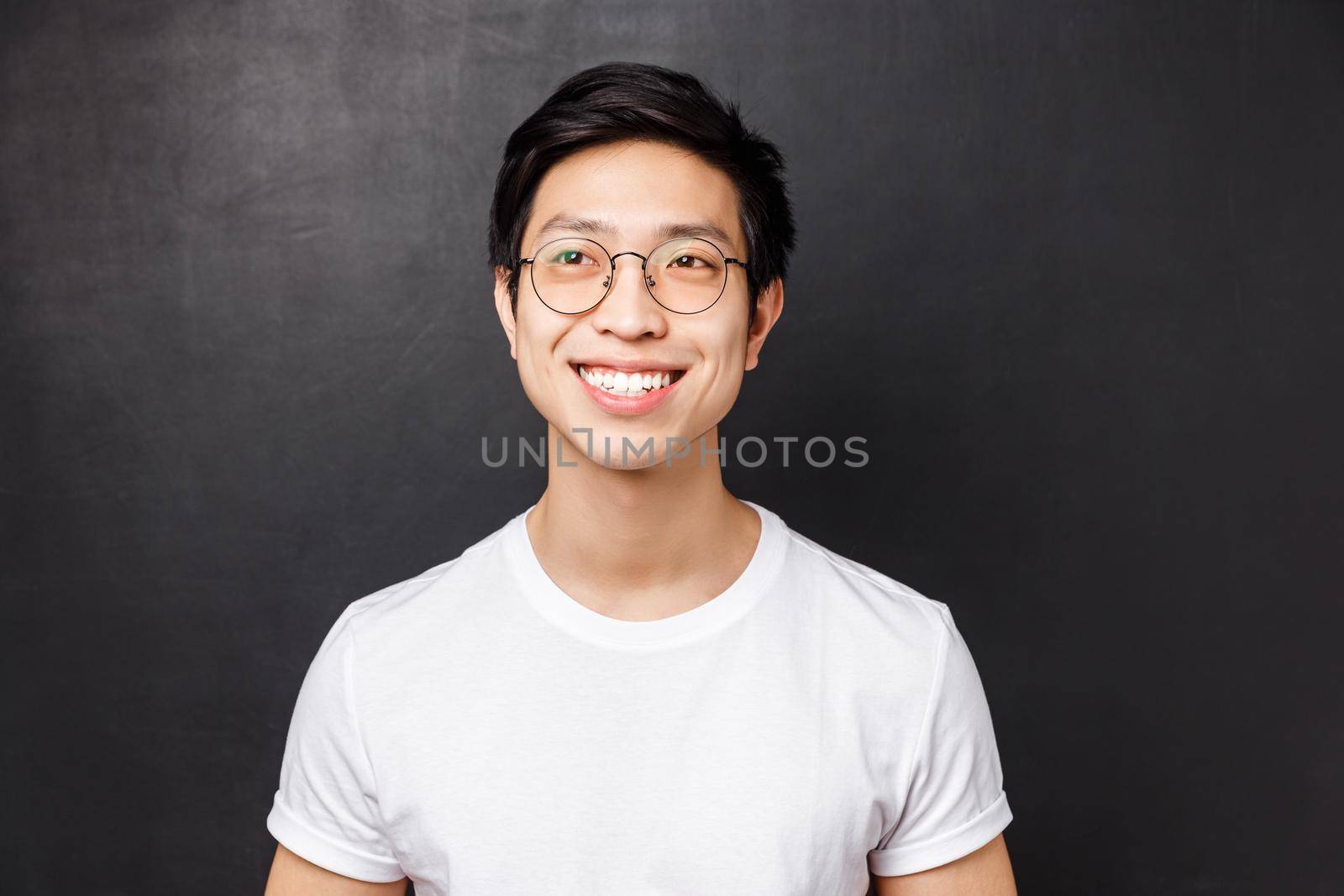 Close-up portrait of dreamy happy young asian man in white t-shirt, glasses, beaming smile excited, looking left cheerful, standing black background, remember something cute by Benzoix