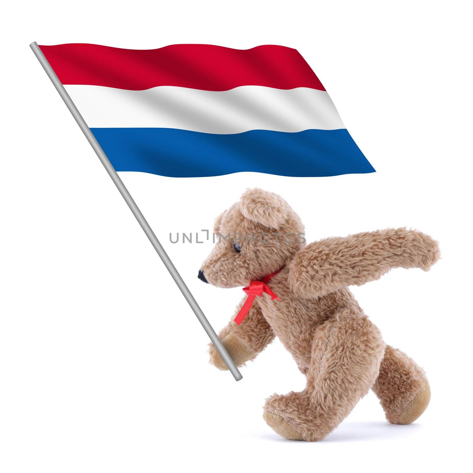 A Netherlands Holland flag being carried by a cute teddy bear