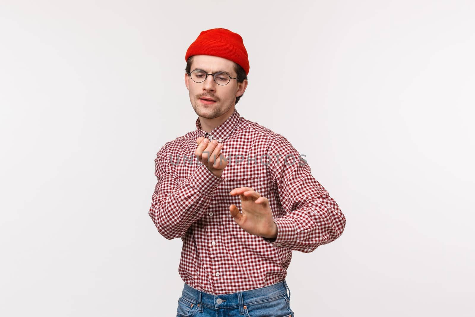 Geeky guy vibing and having fun. Carefree cute funny man in red beanie and glasses, dancing clumsy on dancefloor, enjoy awesome office party, celebrating holiday or triumphing over win by Benzoix
