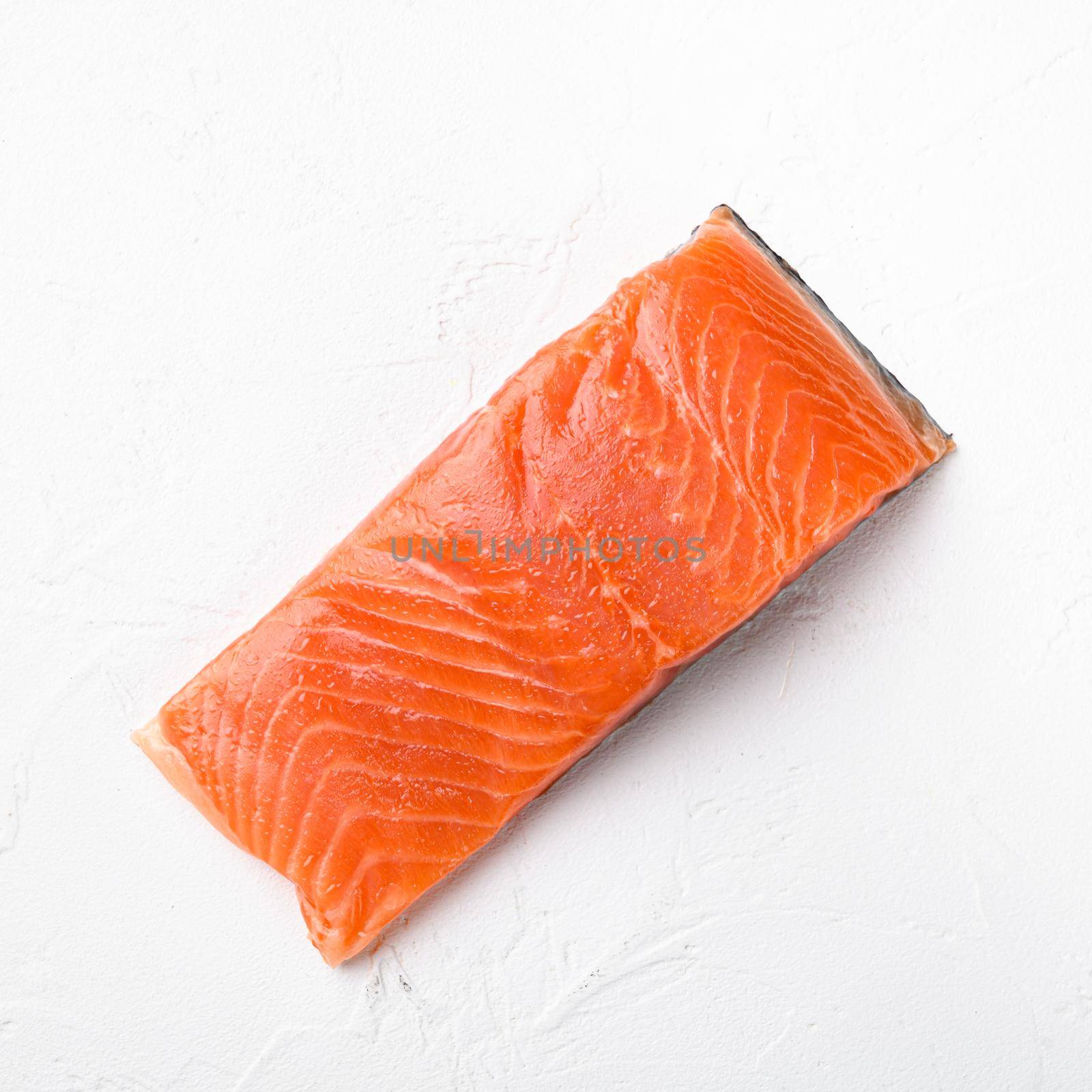 Salmon. Fresh raw salmon fish fillet set, square format, on white stone table background, top view flat lay, with copy space for text