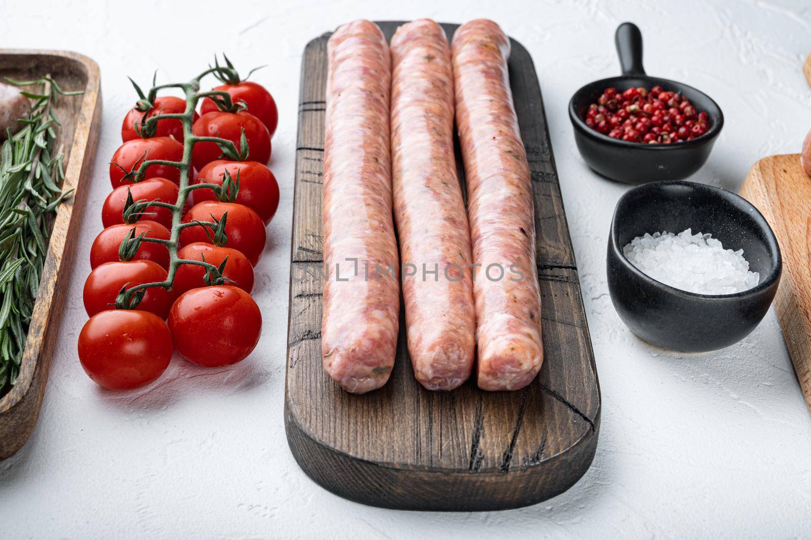 Beef sausages, on white background.