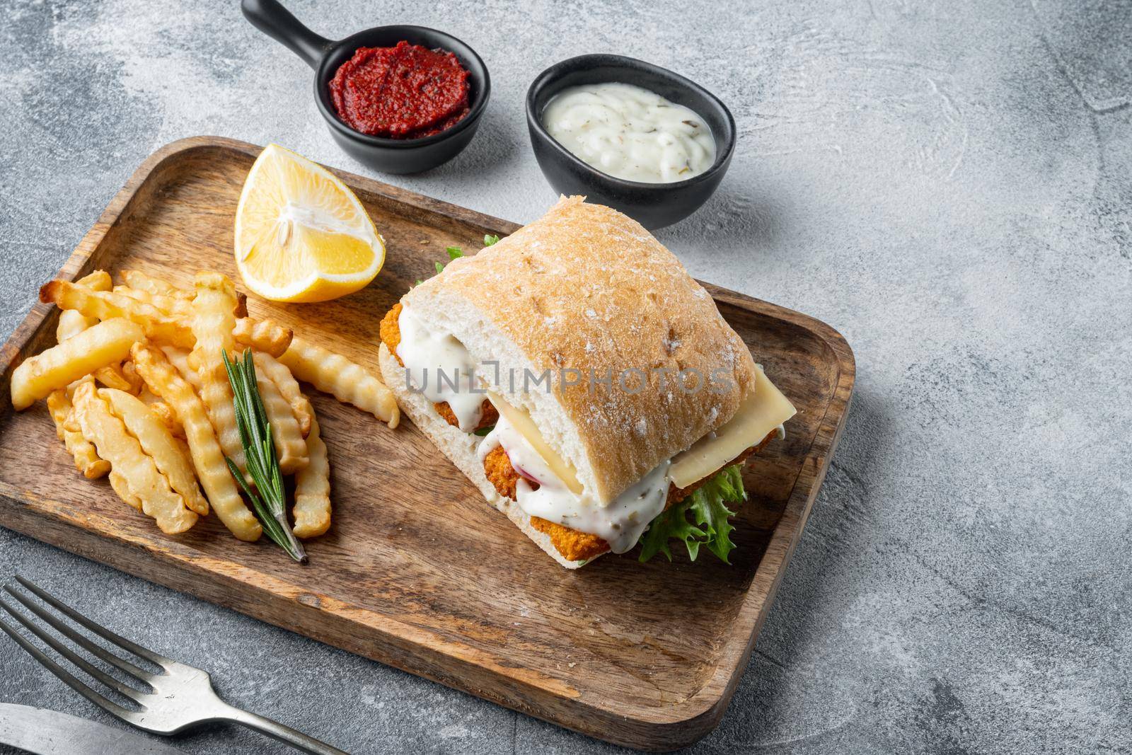 Sandwich with Fish Sticks set, on gray background , with copyspace and space for text