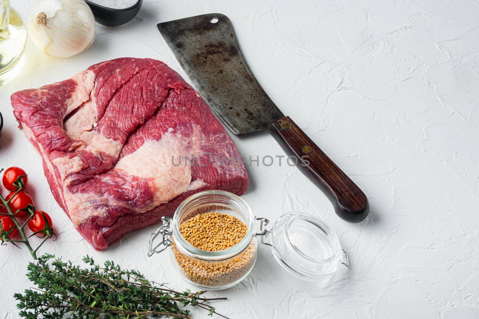 Packer brisket, raw beef brisket meat set,with ingredients for smoking making barbecue, pastrami, cure, on white stone background, with copy space for text
