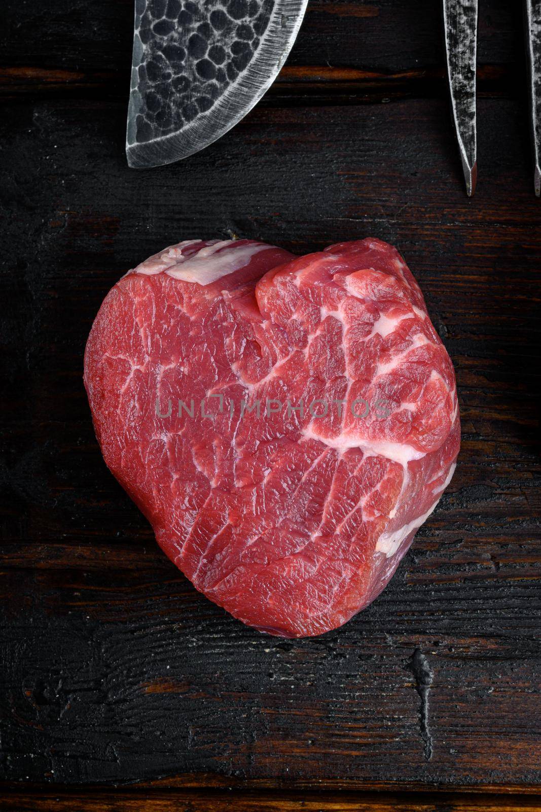 Raw fresh marbled meat Steak filet mignon , on old dark wooden table background, top view flat lay by Ilianesolenyi