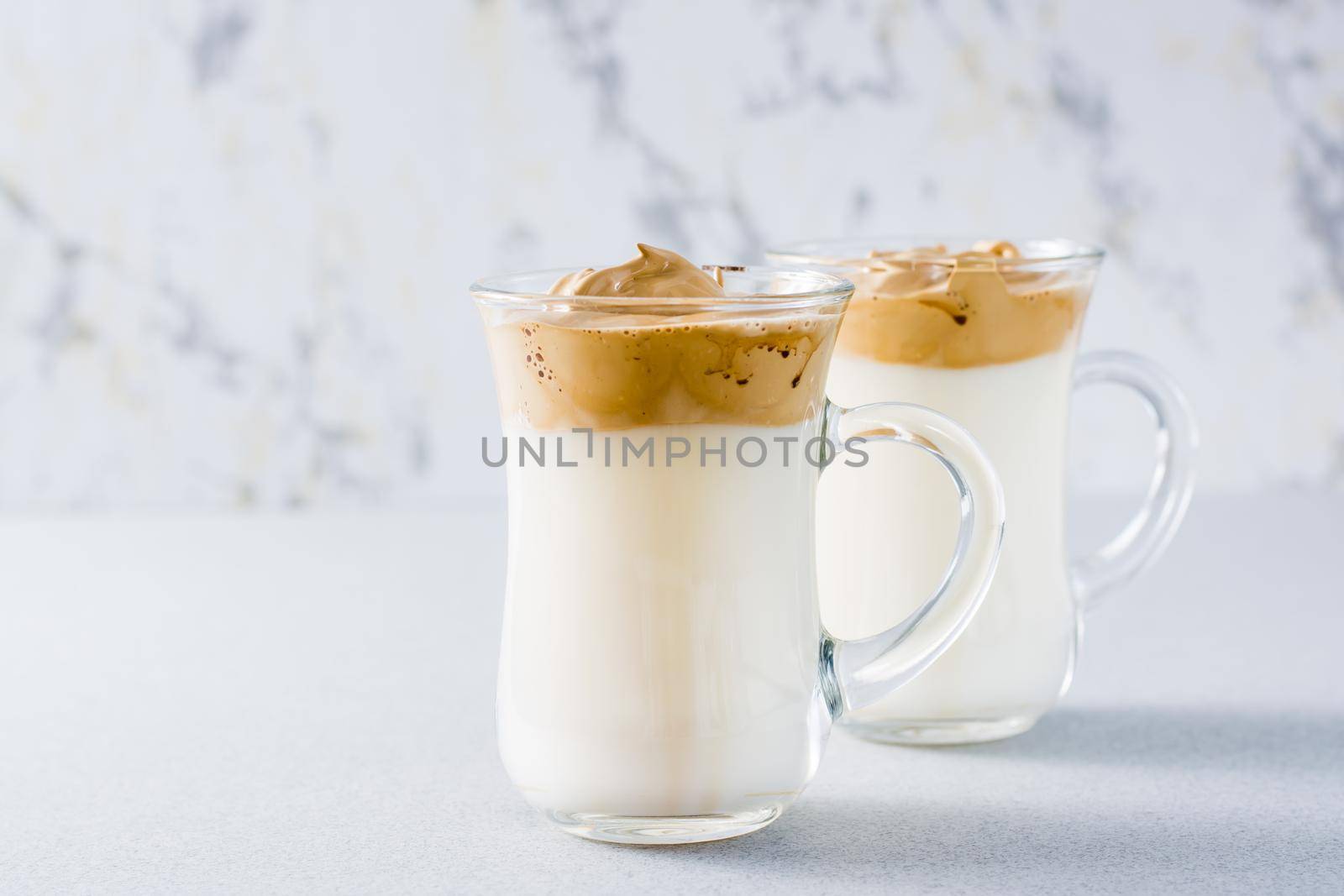 Two cups with dalgona coffee on the table. Quarantine cuisine