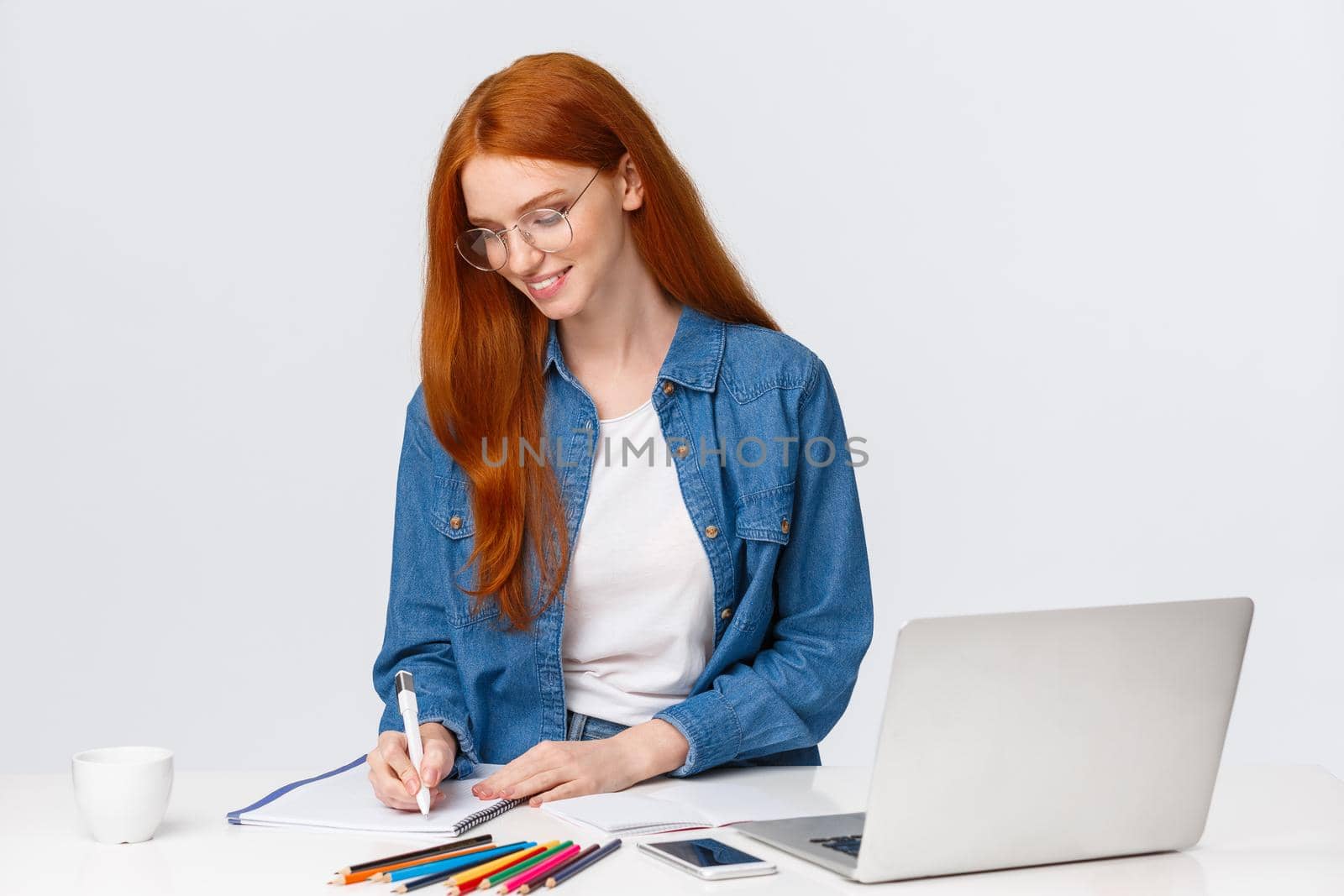 Creative and talented cute girl dream become famous fashion designer, create own designes and project, taking notes as working over tablet with laptop, colored pencils, drawing, white background.
