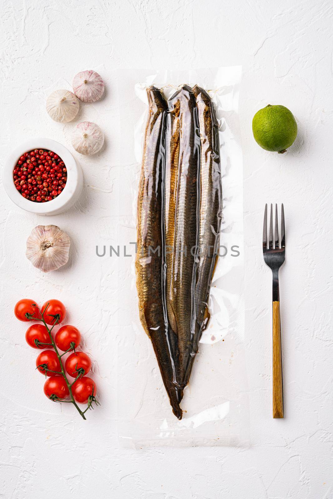 Smoked Lamprey seafood delicacy vacuum pack set, on white stone table background, top view flat lay