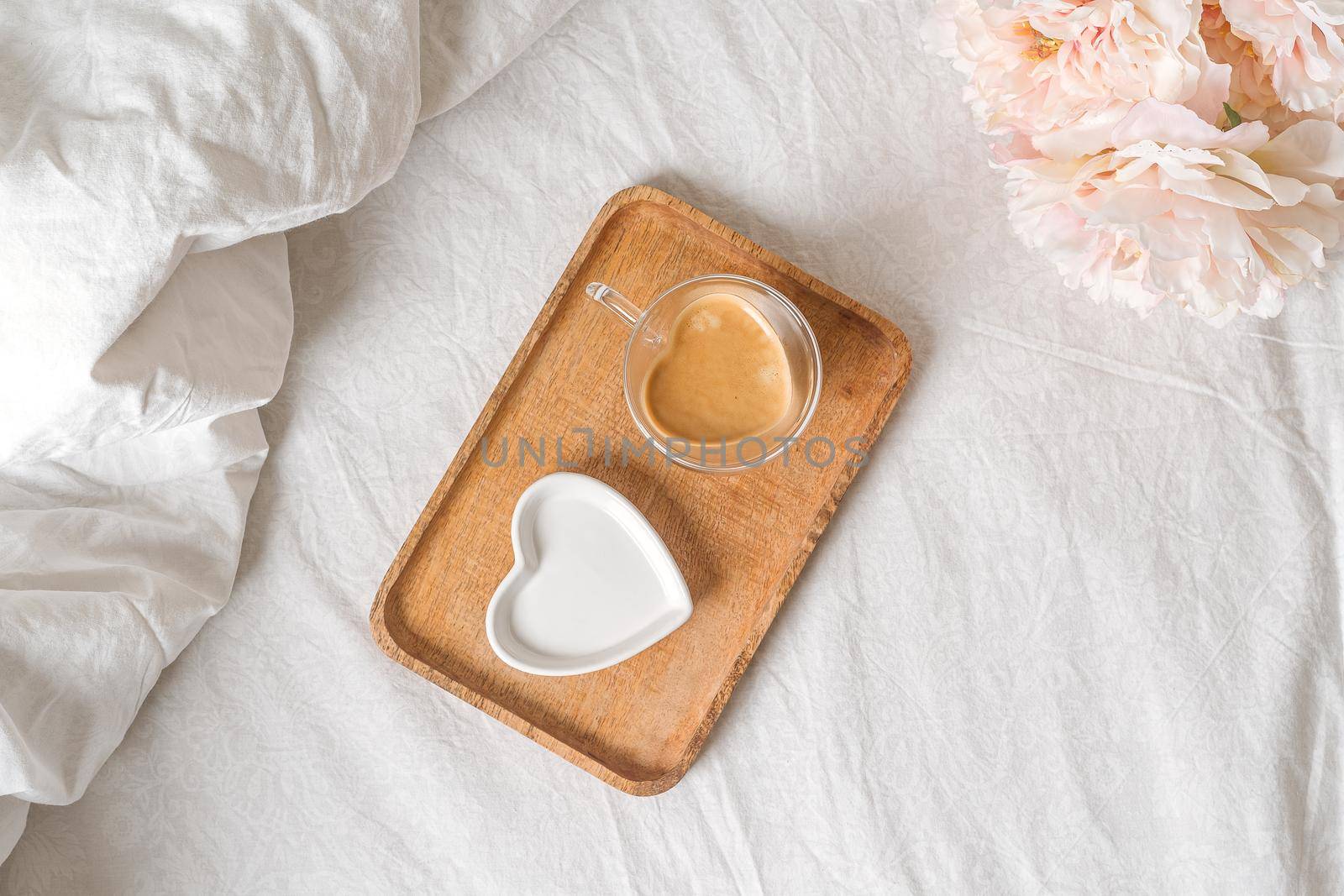 Valentine day lifestyle composition. Still life Mockup scene with plate and cup of coffee. Breakfast in bed. Linen background. Flat lay, top view.