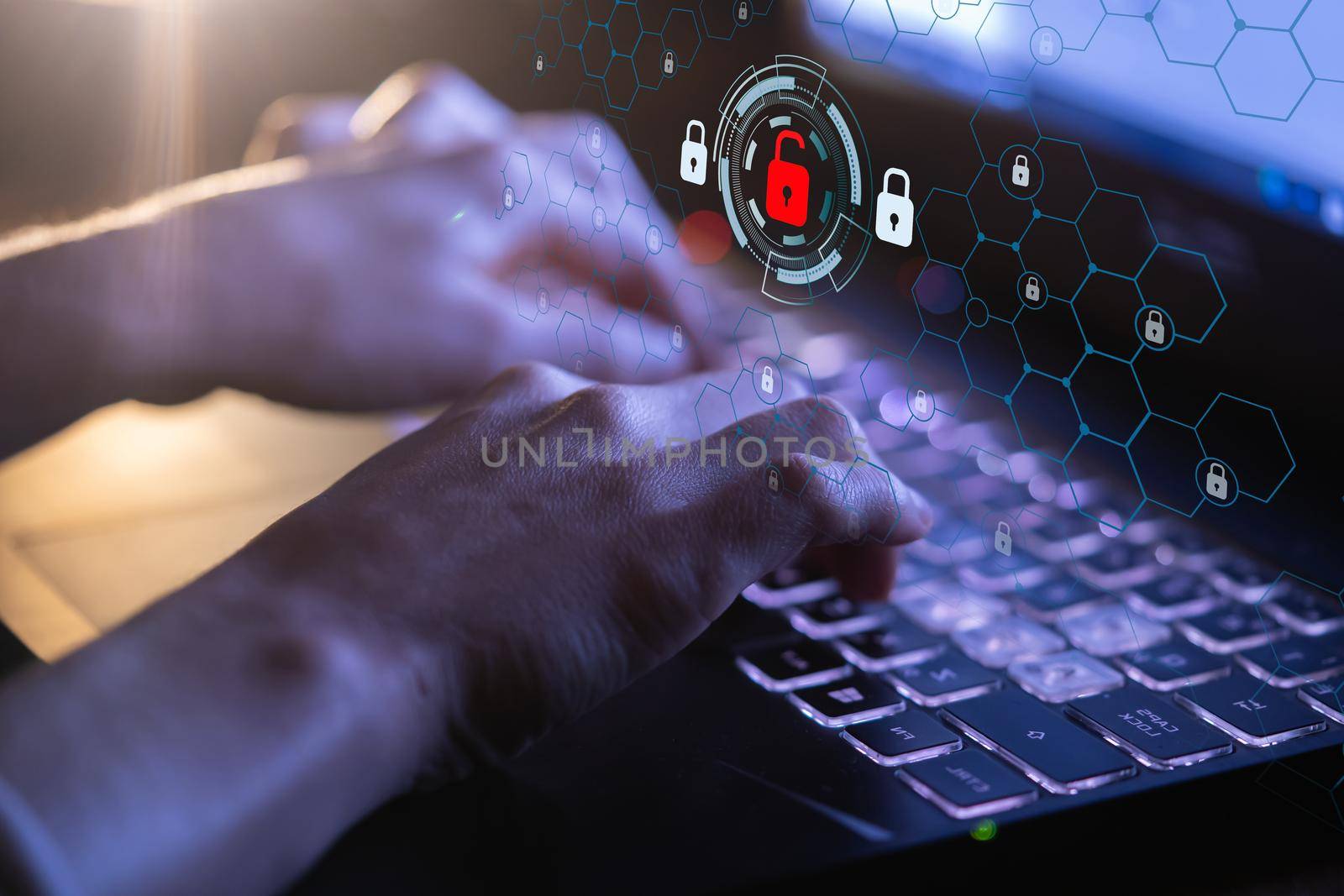 Problems with unprotected data in the workplace are under threat of hacking, female hands are typing on the keyboard in close-up, trying to pass verification, icons, drawn lock above the laptop.