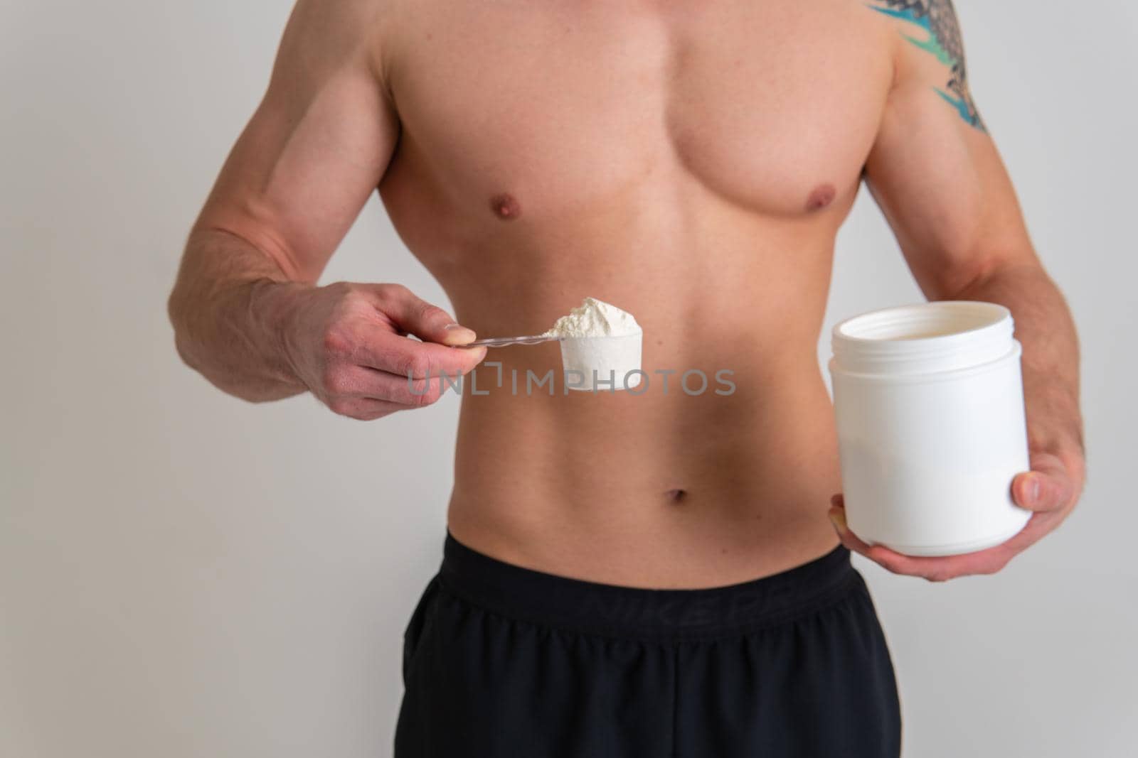 Fitness protein jars white on white background bodybuilder powder strong high sore isolated health adult, holding. Hold lumbar care, lower suffer attractive by 89167702191