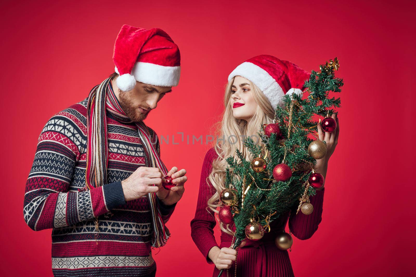 cheerful young couple holiday christmas decoration romance. High quality photo