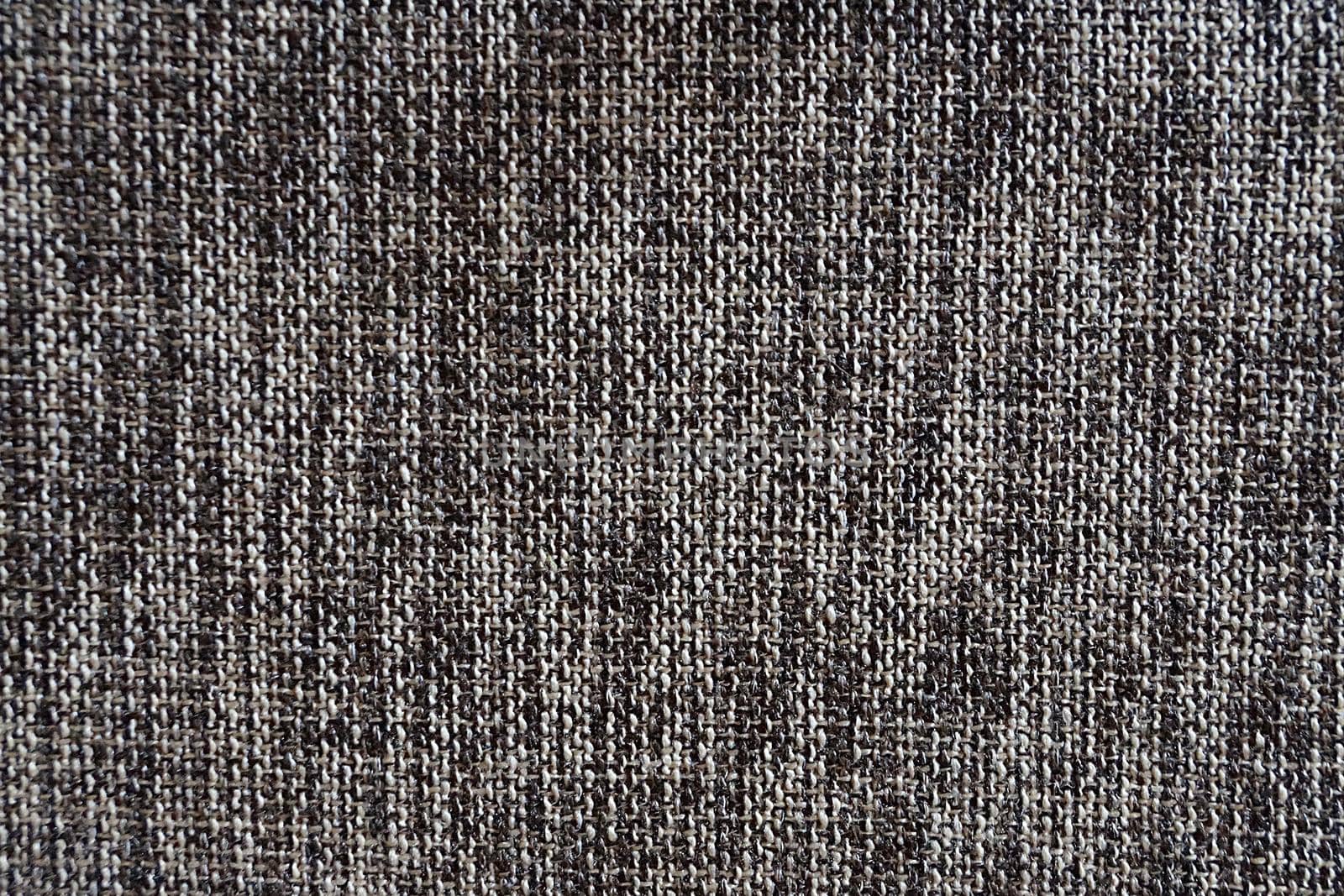 Gray canvas fabric for natural textile background close-up