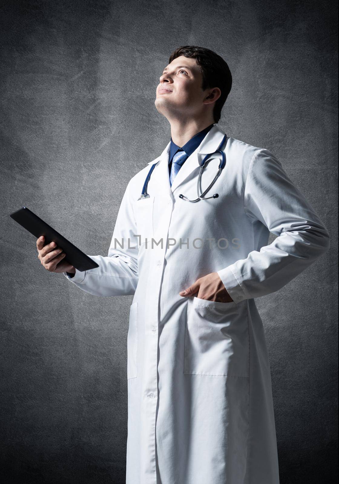 Doctor with a computer tablet by adam121