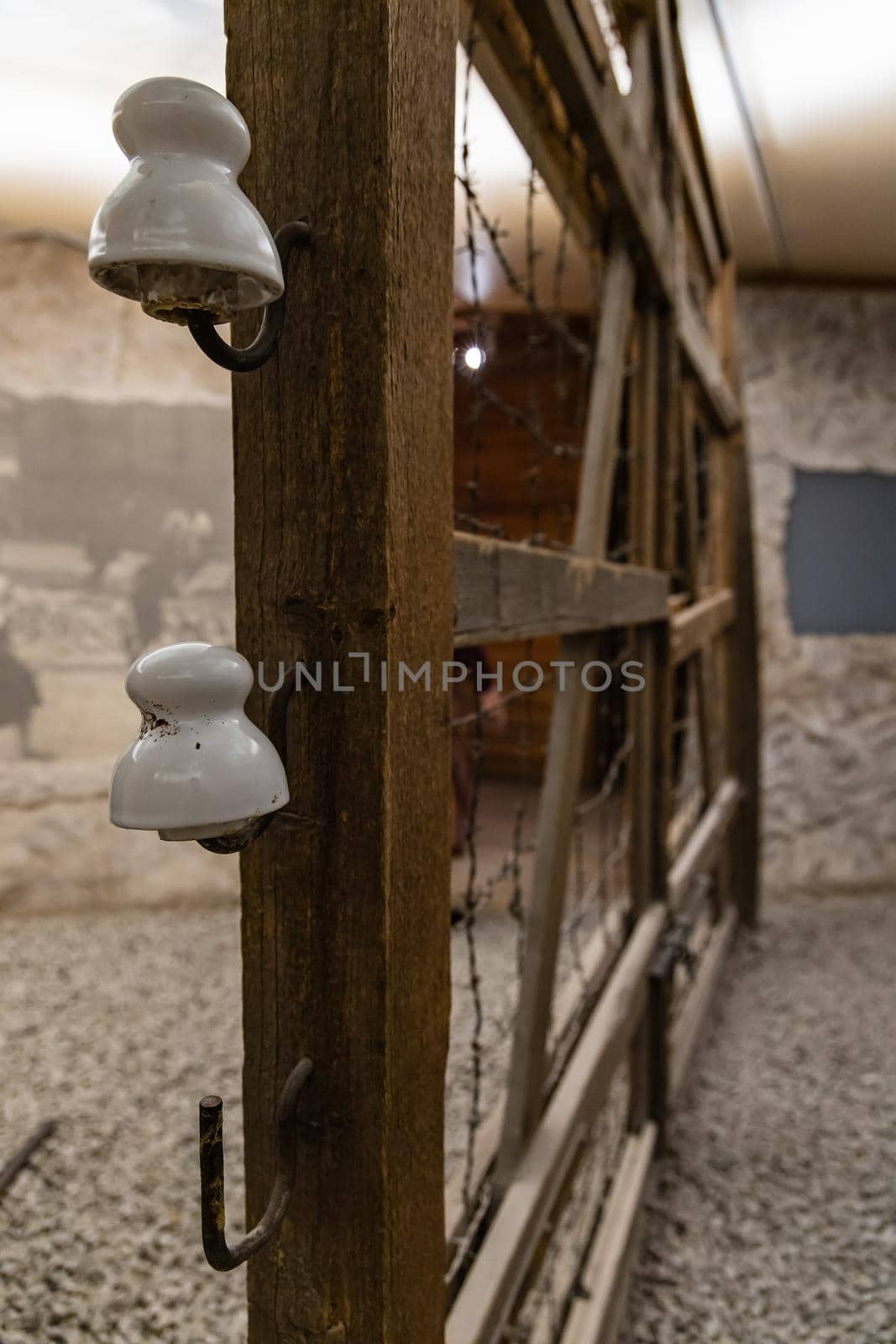 High old wooden fence full of live barbed wire by Wierzchu