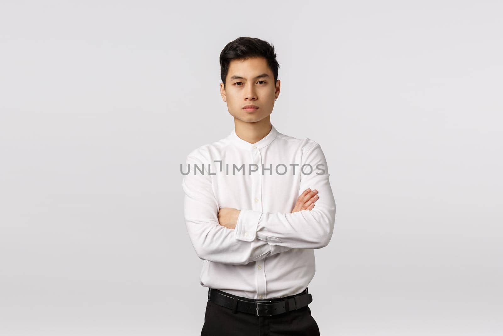 Corporate promo, recruitment and business concept. Attractive self-assured asian male entrepreneur, cross arms over chest, look camera focused and confident, able handle any task, solve problems.