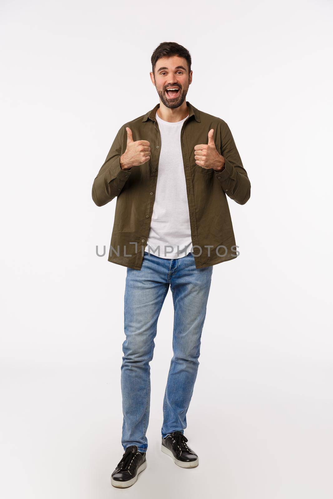 Full-length vertical studio shot cheerful good-looking bearded guy adores friends idea, show thumbs-up in like, approval or acceptance gesture, nod agreement, thinks plan awesome, white background by Benzoix