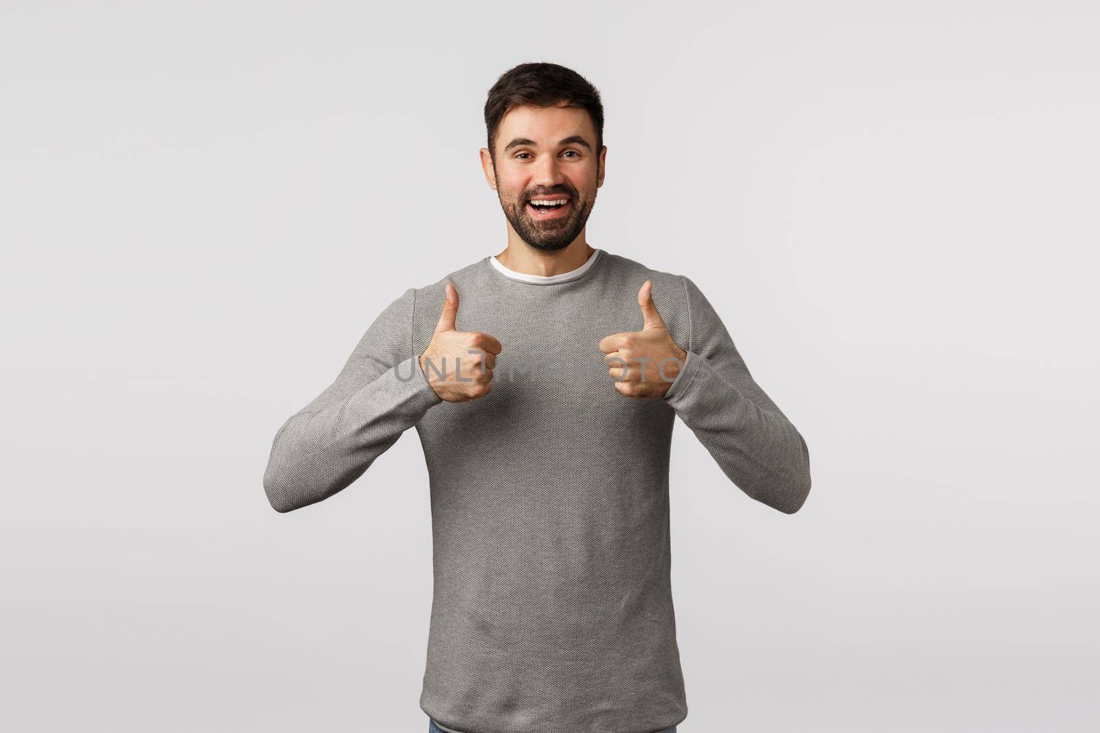 Goog idea, keep up. Cheerful and handsome bearded boyfriend encourage partner, show thumbs-up in like, approval or acceptance gesture, nod agreement, smiling as like awesome product, recommend.