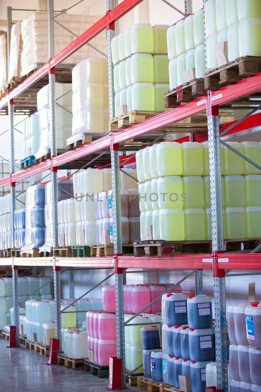 Belarus, the city of Mensk, April 12, 2019. Chemical production.Warehouse with shelves, plastic cans.Warehouse with container