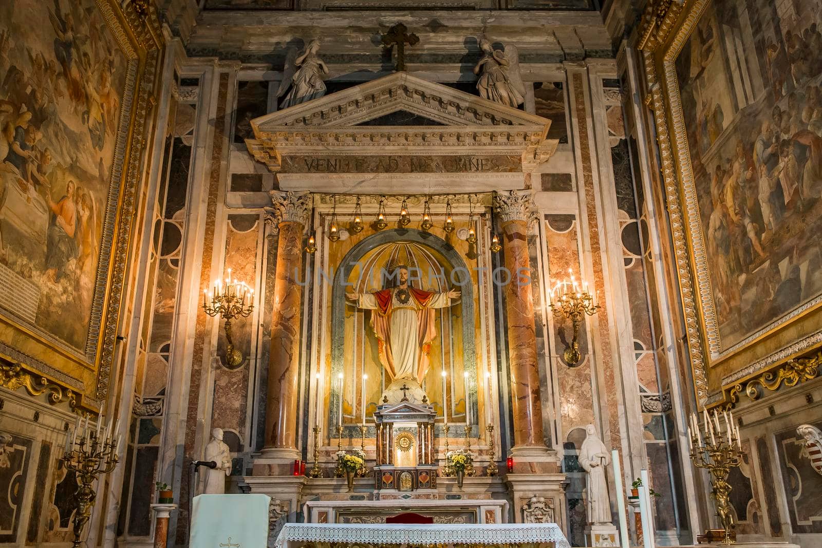 NAPLES, ITALY – MAY 15, 2014: Interiors and details of barroco church of the Gesu Nuovo, built year 1601, May 15, 2014,  in  Naples, Italy.