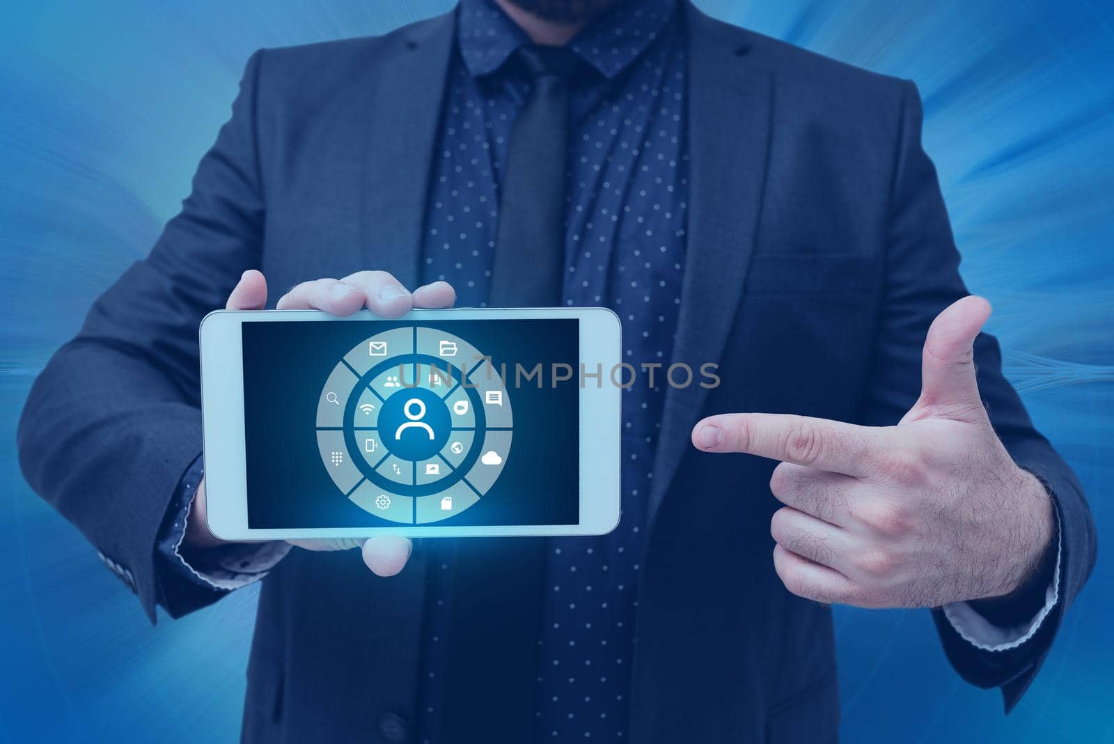 Man holding Screen Of Mobile Phone Showing The Futuristic Technology. Businessman Presenting Cell Phone Inside Room Presenting Modern Automation. by nialowwa