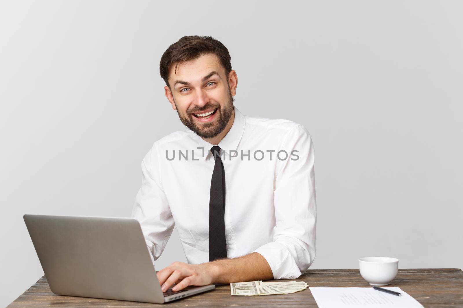 Young businessman in a workplace with surprise and shocked facial expression by Benzoix