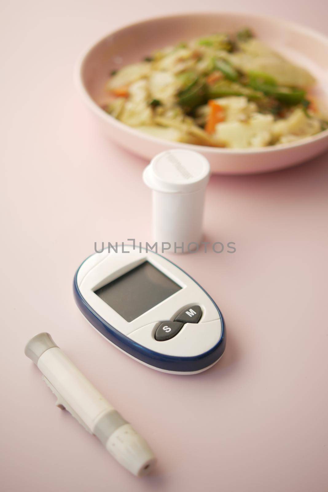 diabetic measurement tools and healthy food on table by towfiq007