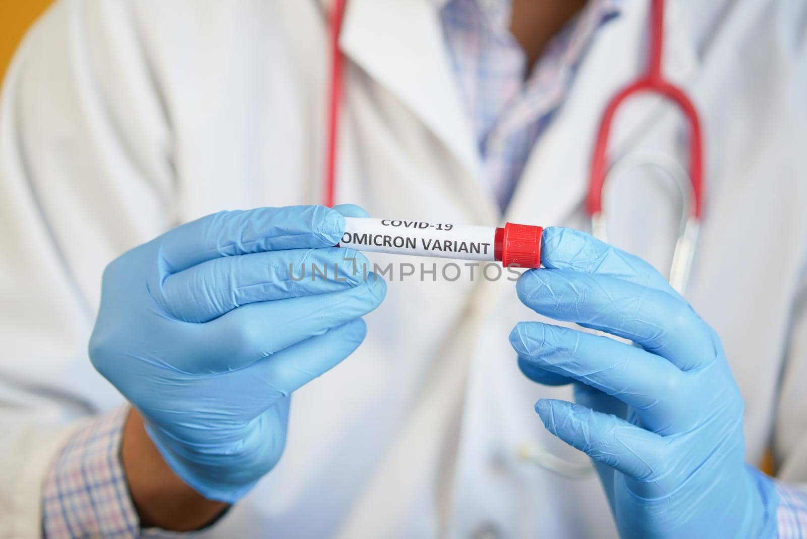 close up of corona virus blood test tube on table .