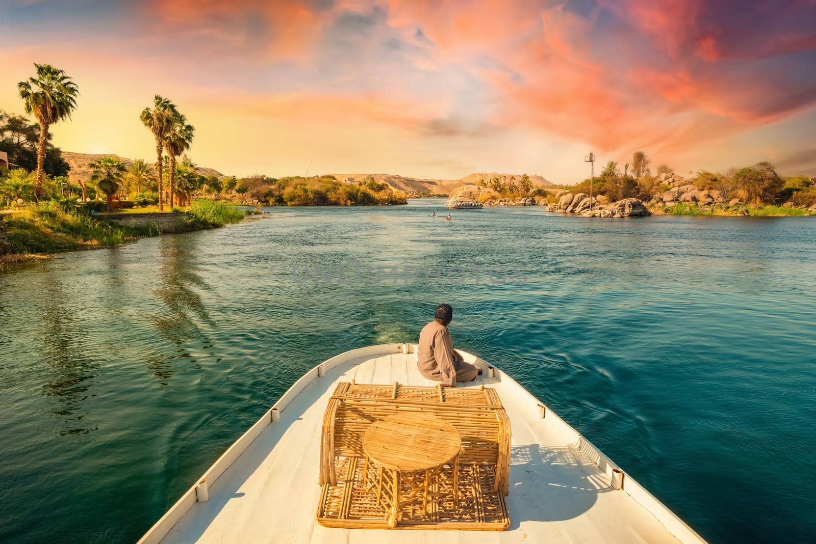 Boat on the nile at sunset by Givaga