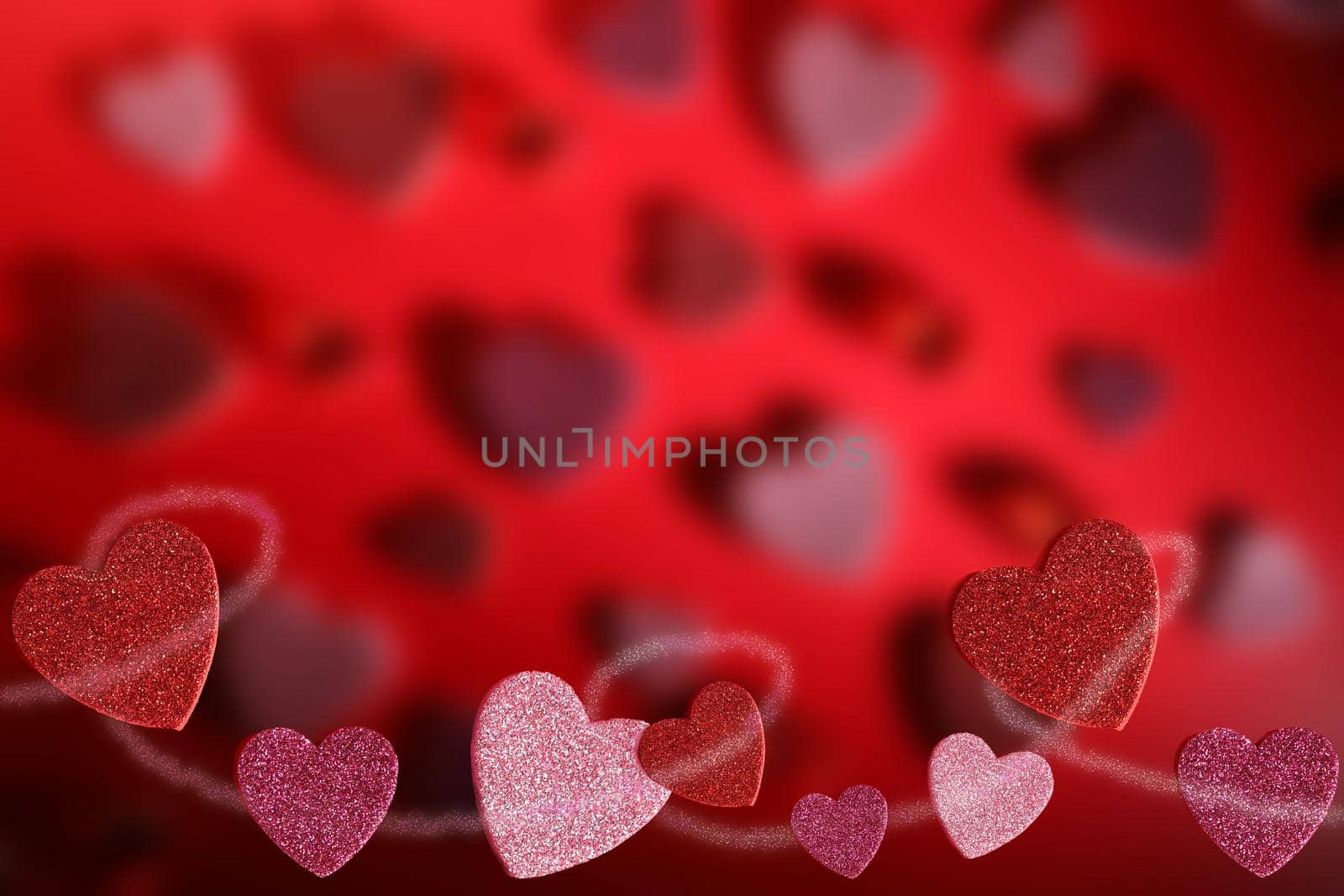 Glittery Pink and Red Hearts on a Defocused Red Heart Background by markvandam