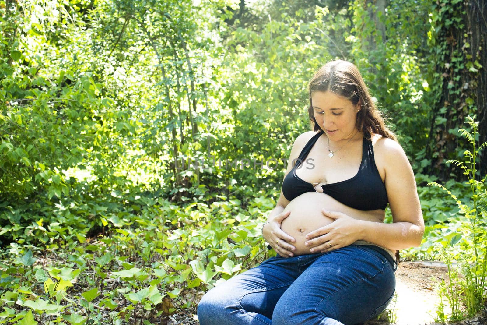 Seven month pregnant woman in a park by GemaIbarra