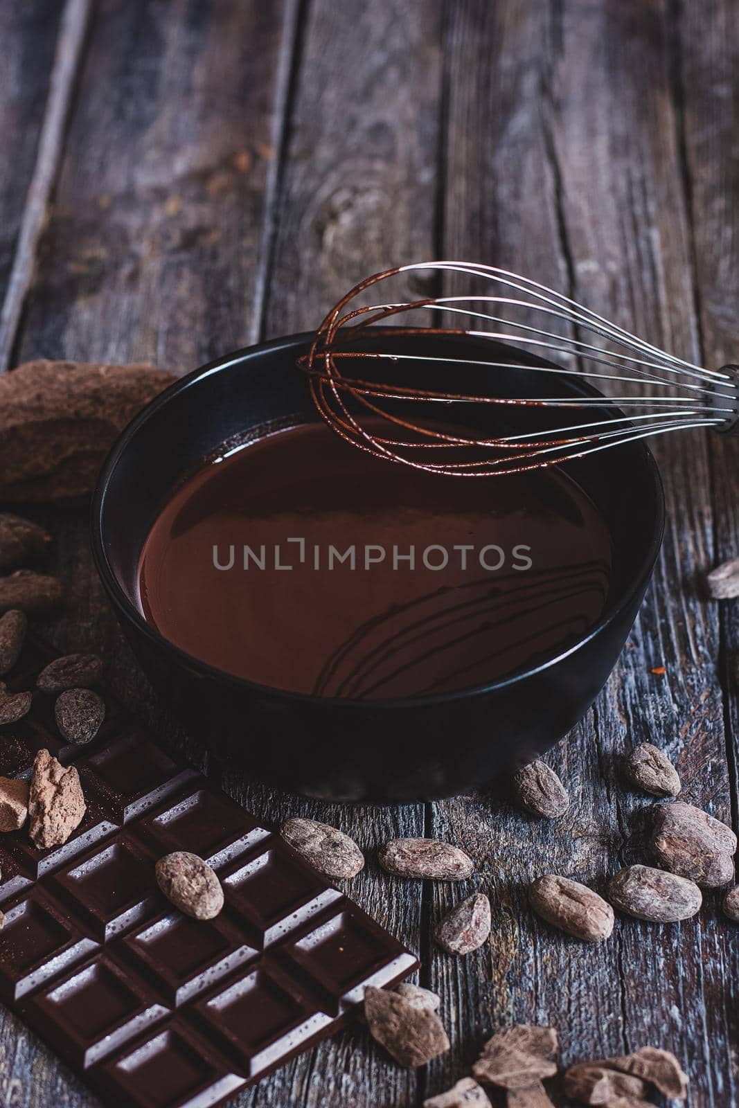 Preparation handmade chocolate candies. Ingredients for making chocolate - cocoa beans.