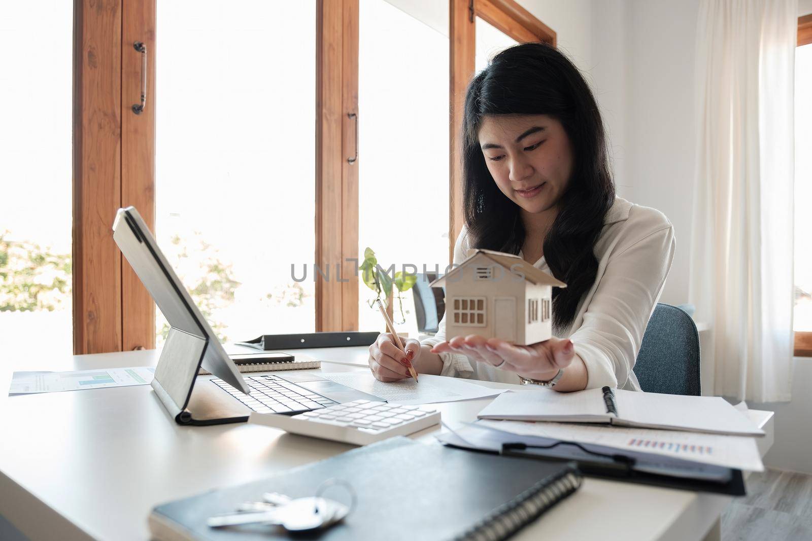 Real estate agent working for house insurance or loan real estate. rent a house,get insurance or loan real estate or property