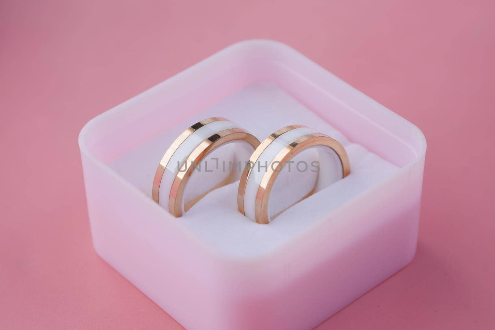 close up wedding ring in a box on r table .