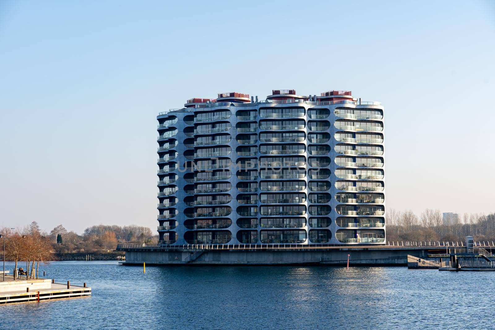 Copenhagen, Denmark - January 10, 2022: Modern residential building Metropolis on Sluseholm in Sydhavn district.