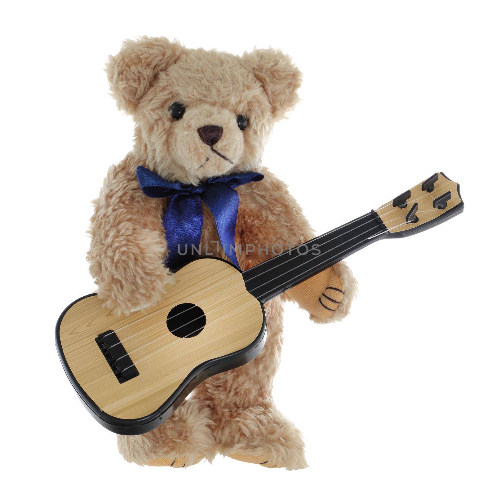 A cute teddy bear playing a guitar