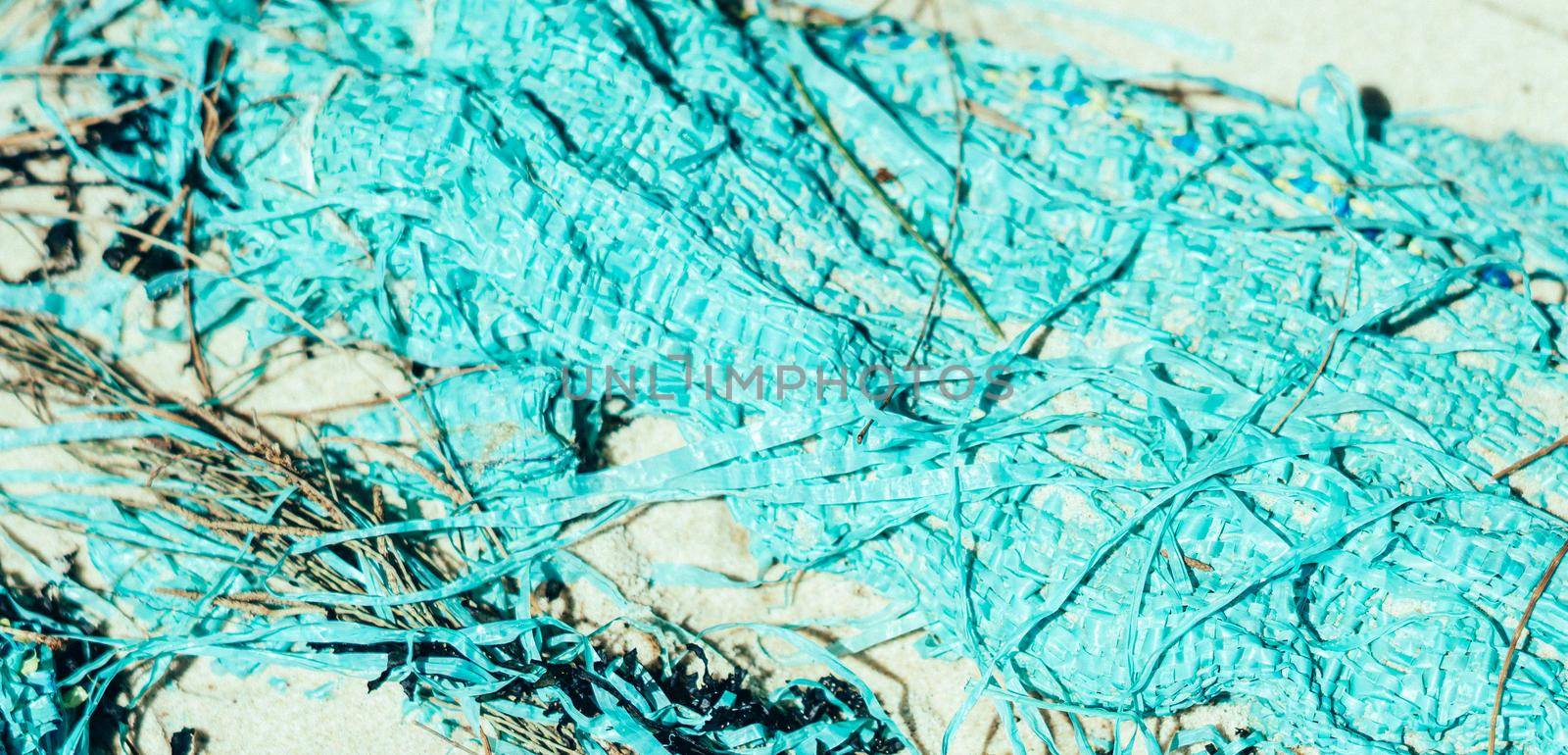 BANNER abstract beauty background. Copy space soft bag cloth rag fabric flap texture surface material on sand ground. Turquoise light blue colour. Design lines maze life photography. More in stock.