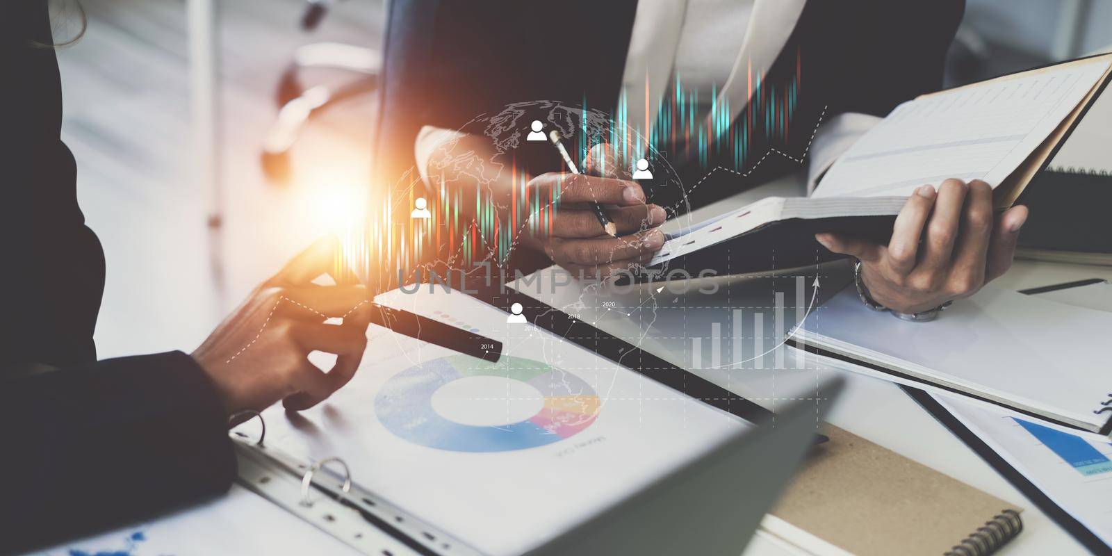 Fund managers team consultation and discuss about analysis Investment stock market by paperwork. Business finance and tax concept