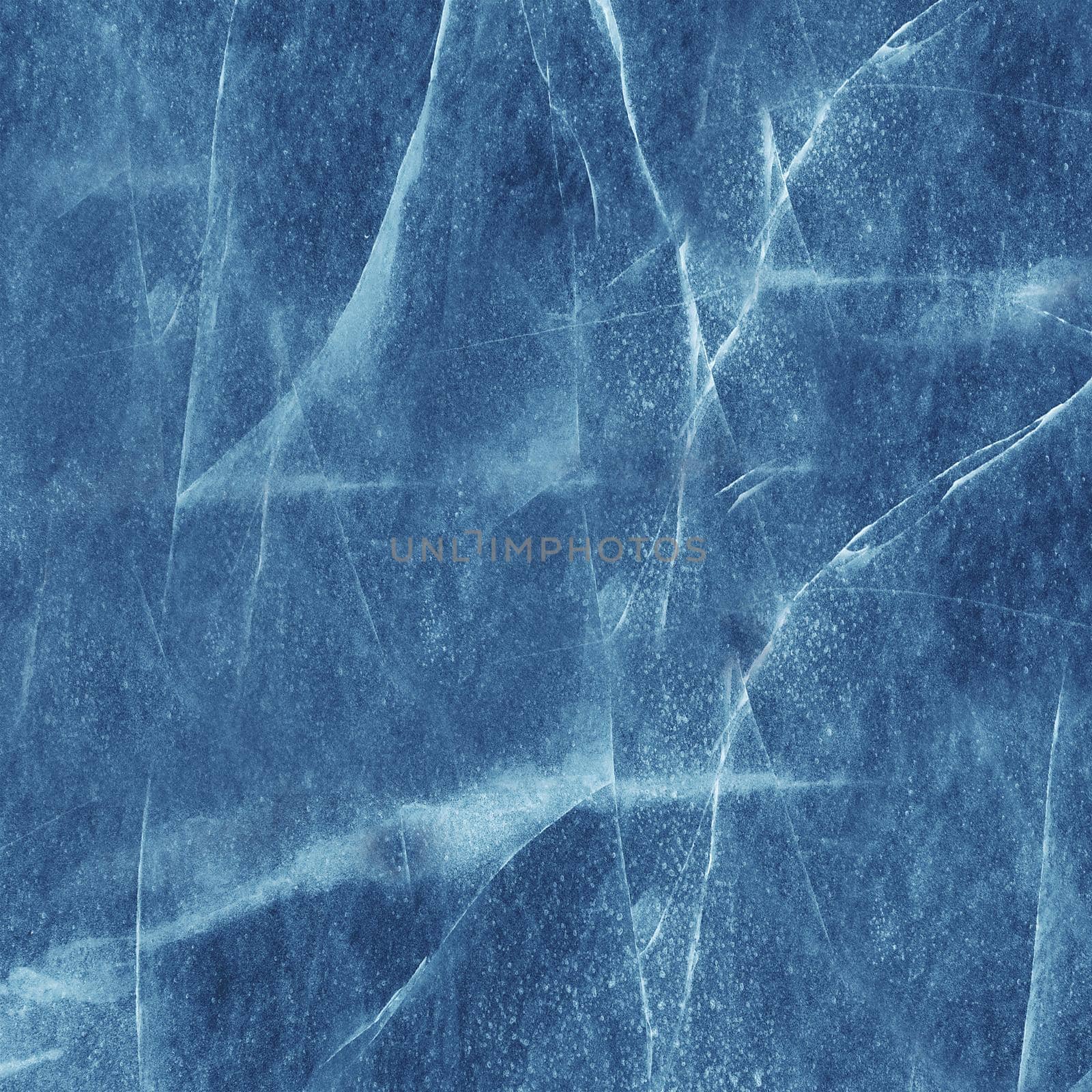 The cracked surface of the ice is blue.Texture or background