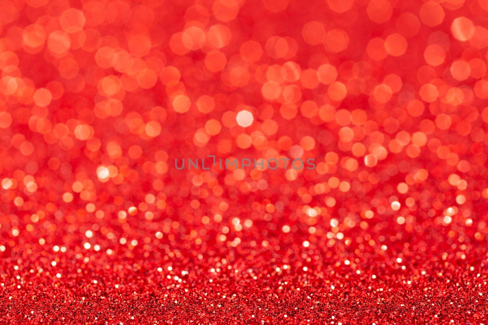 sparkles of Red glitter abstract background. Copy space.