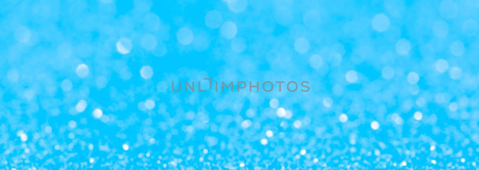 sparkles of Blue glitter abstract background. Copy space. banner