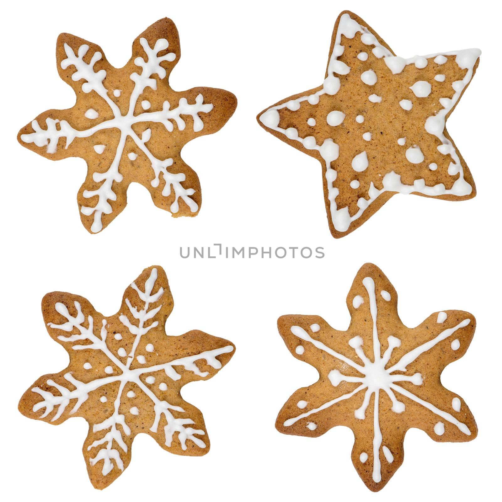 Gingerbread cookie in snowflake shape isolated on white background.