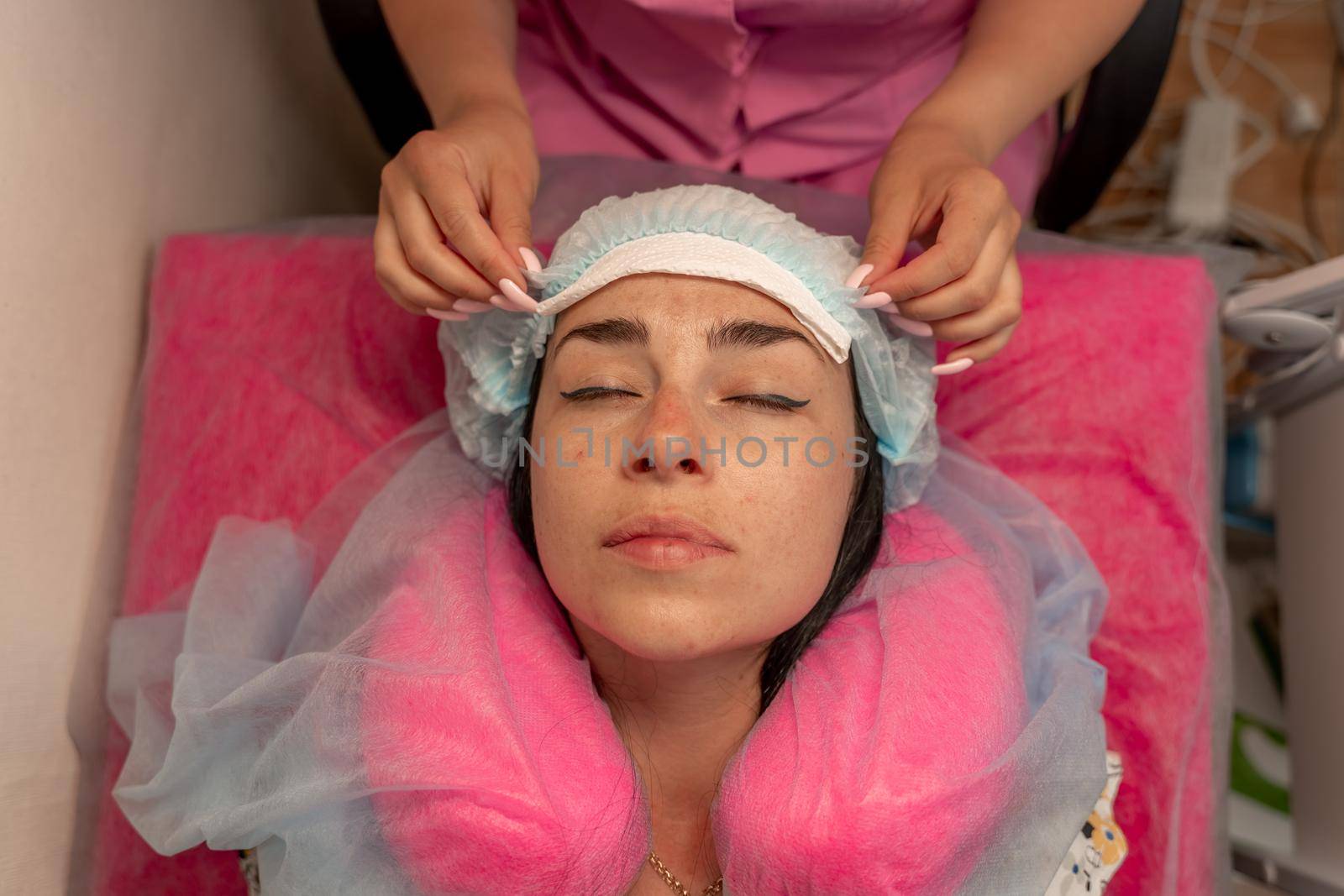 Eyelash extension procedure. Woman eye with long eyelashes. lashes, close up, macro, selective focus. by Matiunina