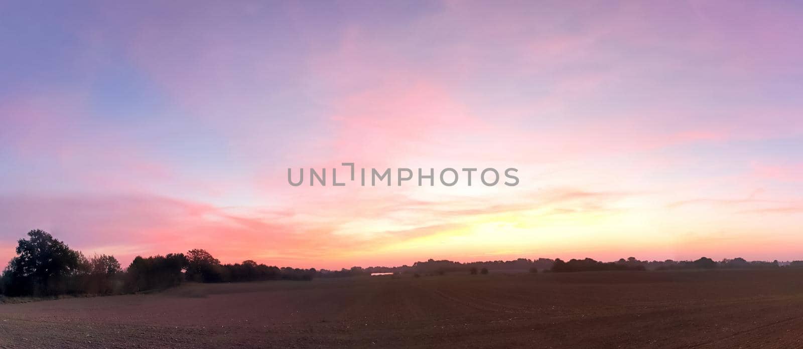 Sunset high resolution panorama of a northern european country landscape.