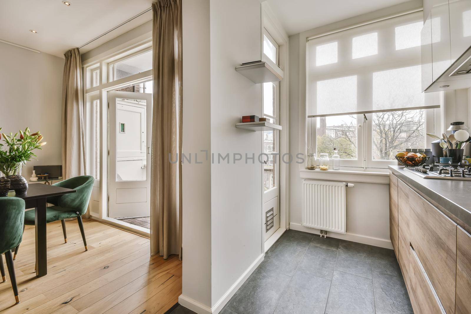 Cozy kitchen zone with in a spacious apartment