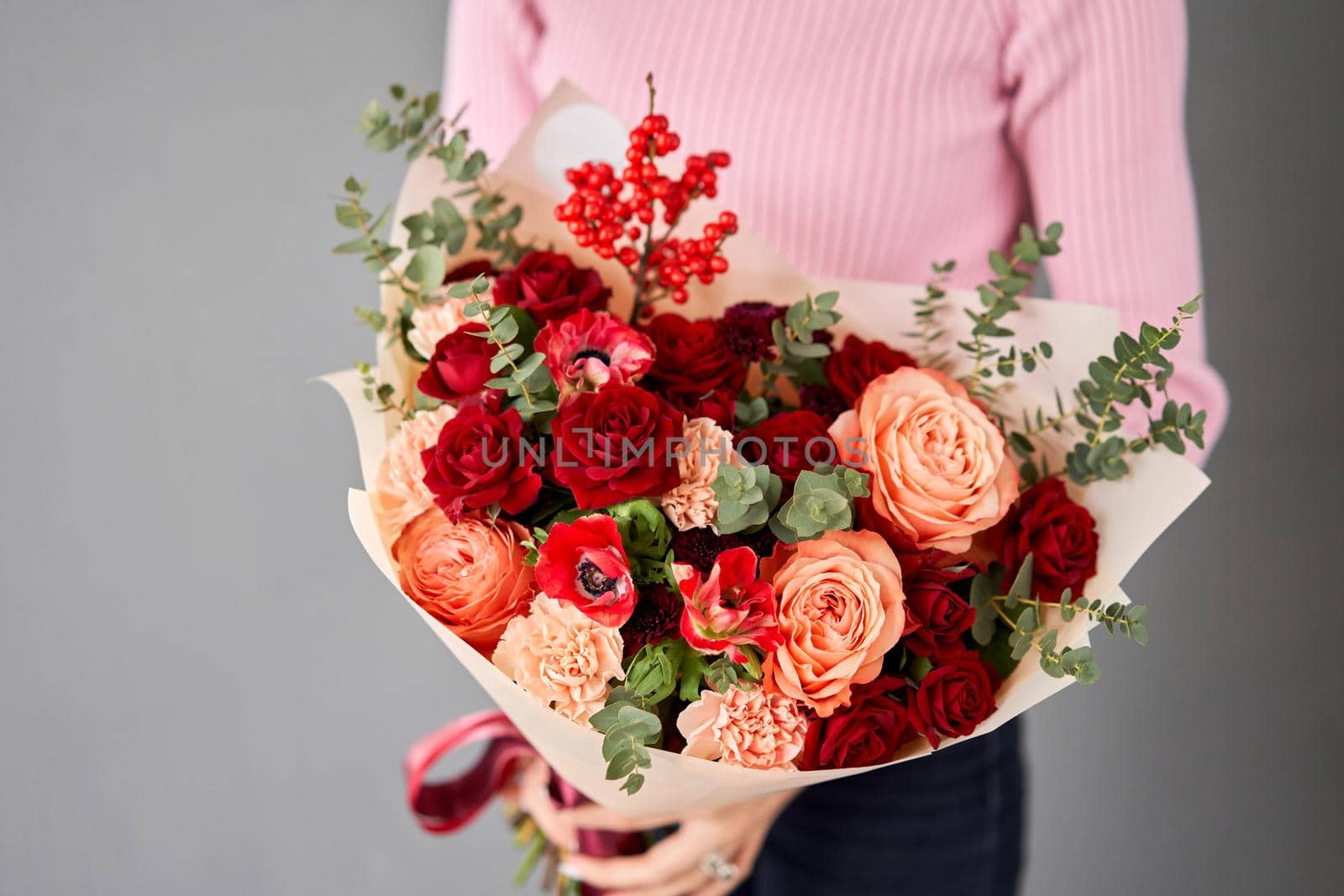 Beautiful large bouquet of mixed flowers without packaging. Handsome fresh bouquet in woman hand. Small flower shop and Flowers delivery. by Malkovkosta