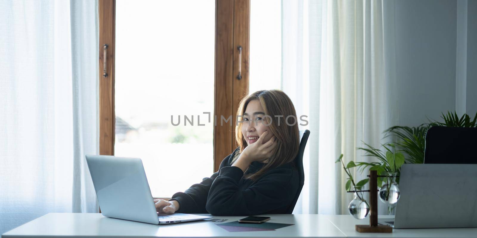 Mockup laptop computer with blank screen. Business people meeting and brainstorming by video conference working at home. by itchaznong