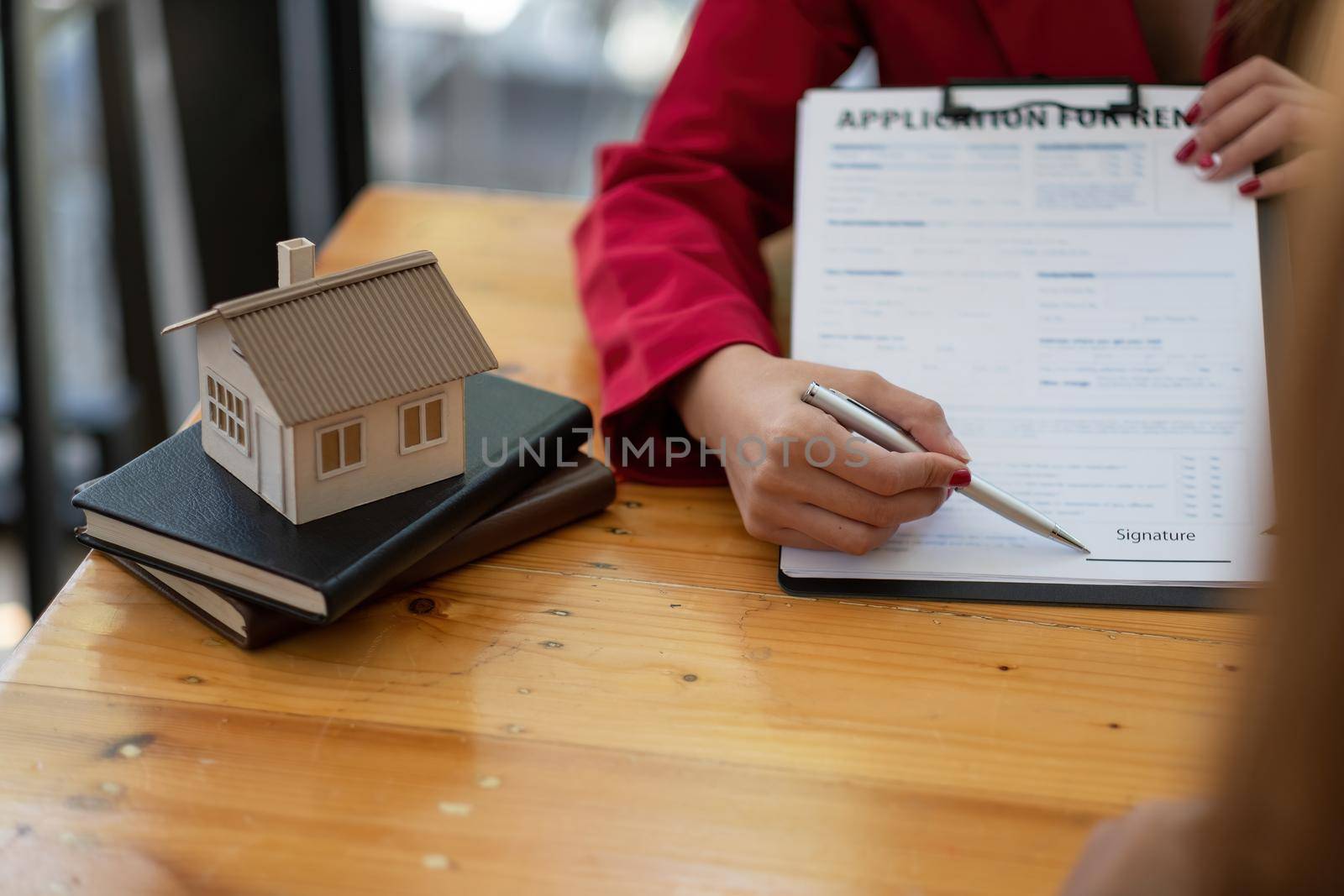 Client sign the documents to make the contract legally, Home sales and home rental real estate concept.