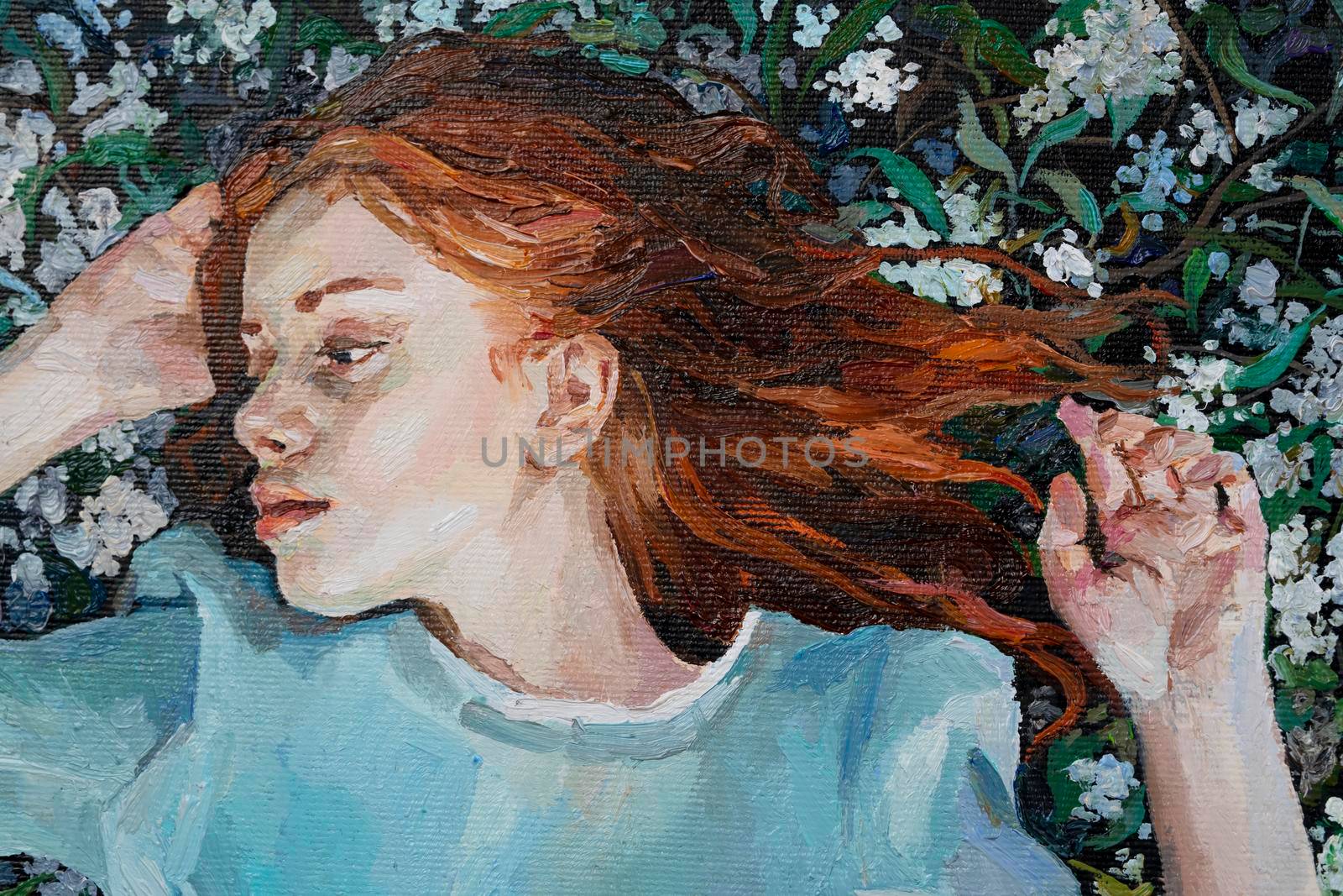 Red-haired beauty, a young girl dreams on the field among different summer herbs and wild flowers. Oil painting on canvas.