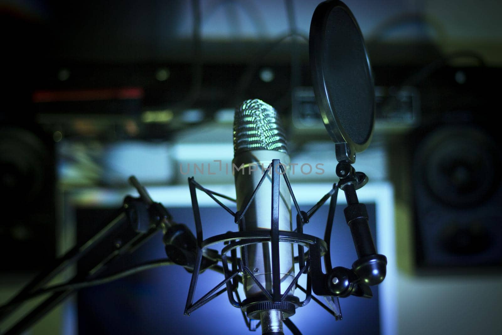 Announcer microphone on recording studio background. No people
