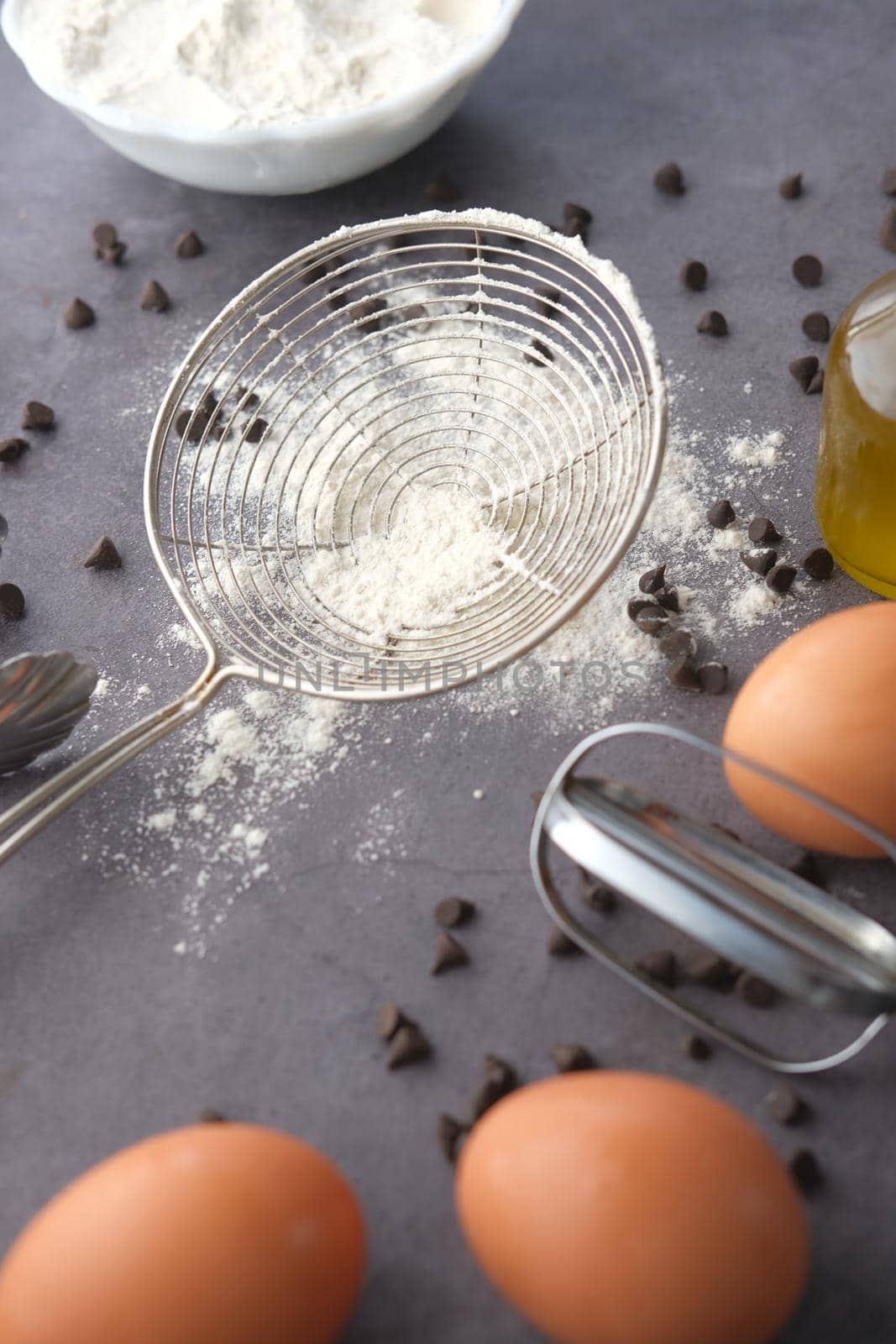 Baking ingredients on a black background, top view. by towfiq007